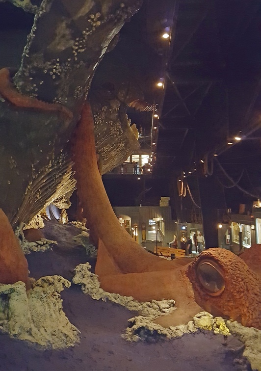 It is difficult to take a picture of a 3 story sculpture of an octopus fighting a whale from a few claustrophobic feet away. Fortunately the walls of all 3 stories filled with the remnants of a maritime museum purchased specifically for filler material.