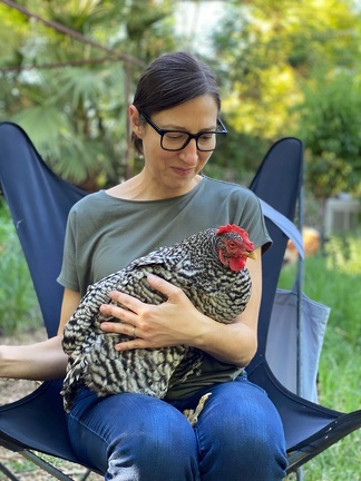 Christy Snuggles Miro's Chicken